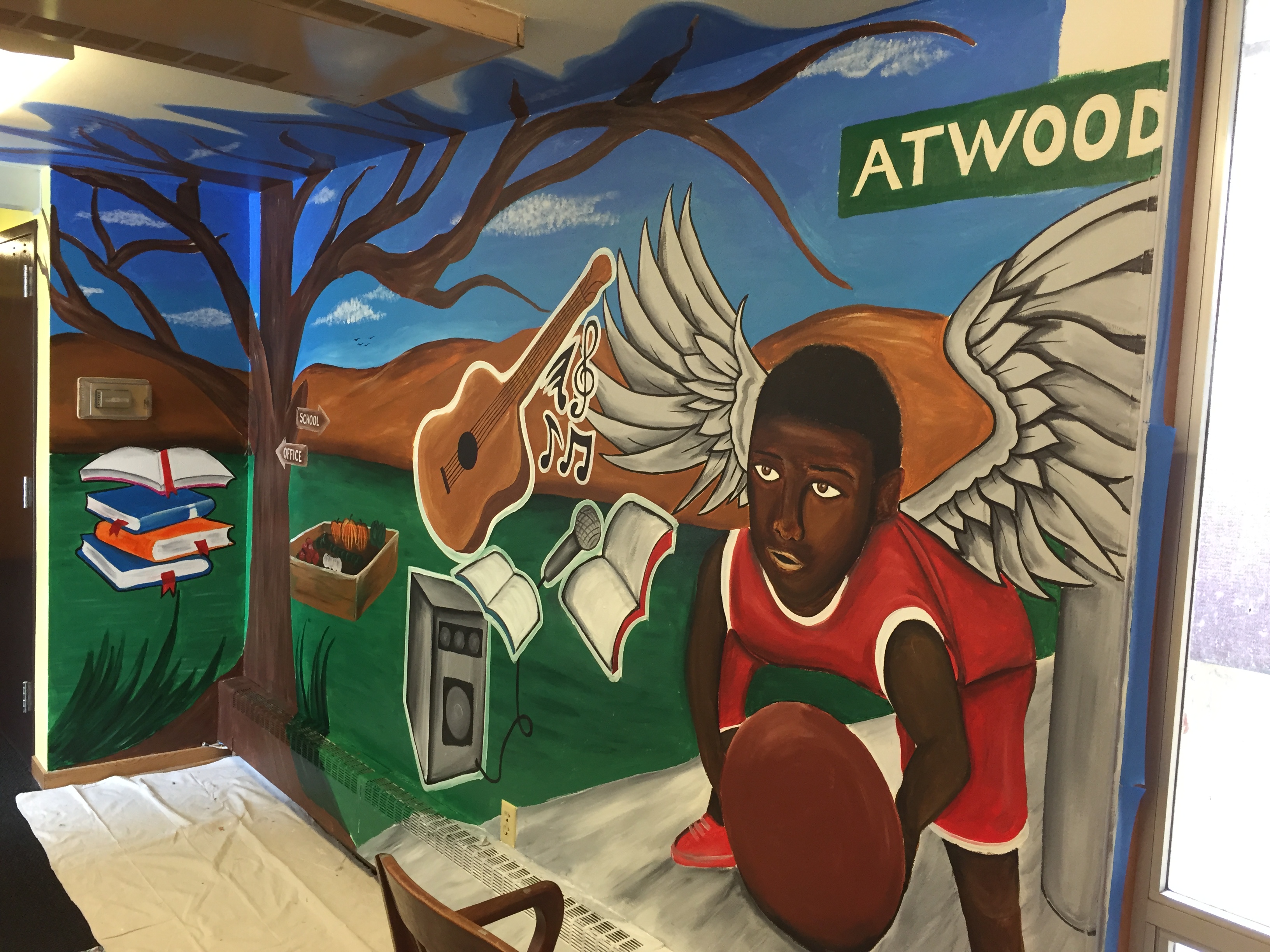 "Welcome" mural at shelter home