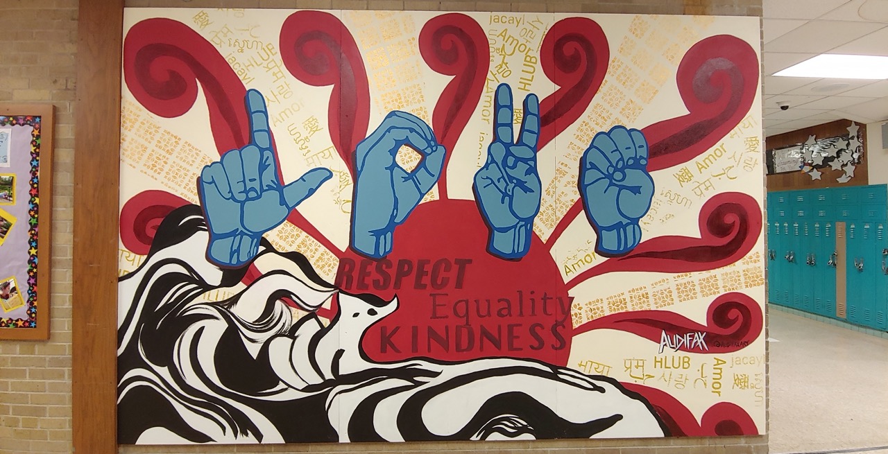 "LOVE IS LEGACY" mural by Audifax and Toki Middle School 8th graders