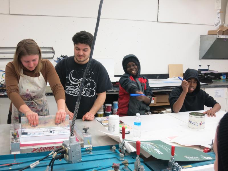 picture of teens screen printing during 15-week Air It Out semester