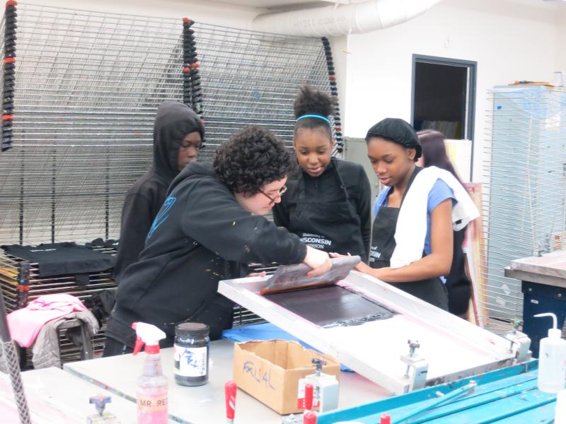 picture of teens screen printing during 15-week Air It Out semester
