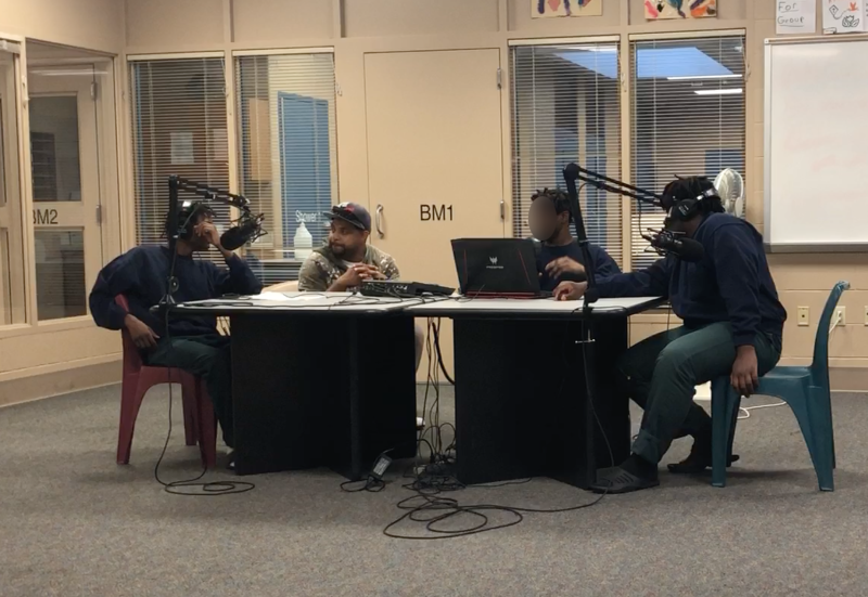 Dee Star leading podcasting workshops with teenagers in juvenile detention center and juvenile court shelter home
