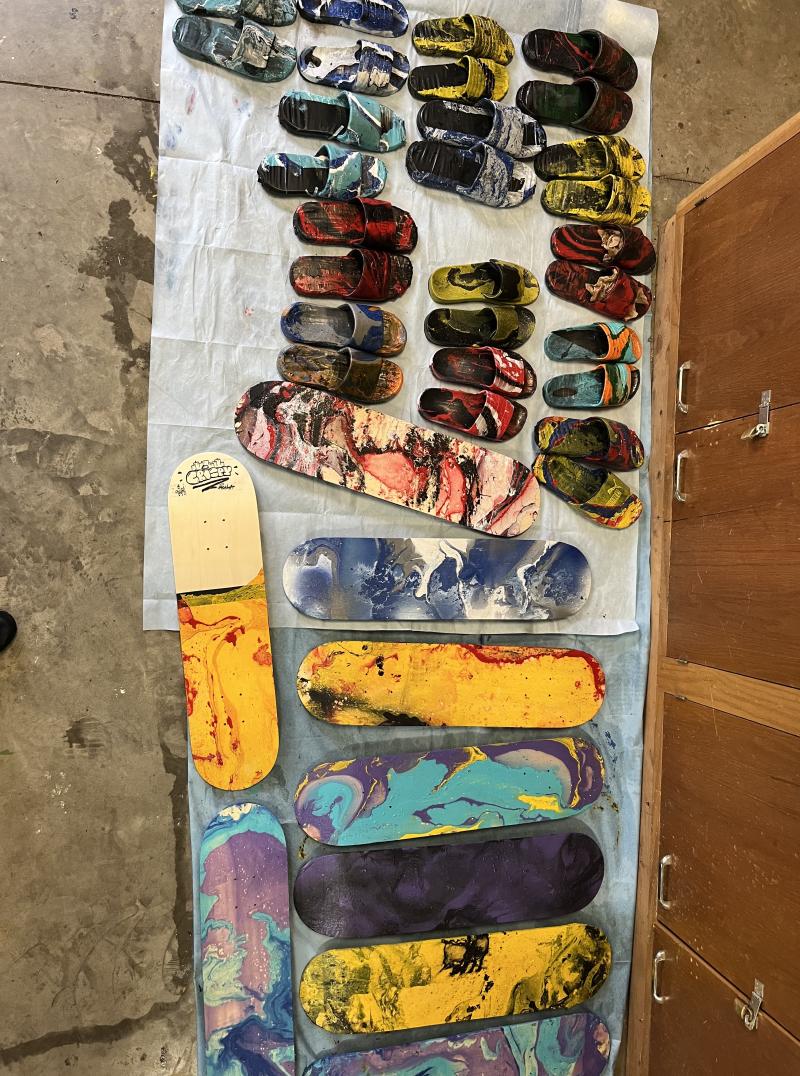 Picture of many hydro-dipped sandals in many unique color and pattern variations