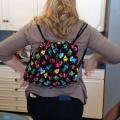 Wearing reversible backpack created with Bird Ross.