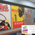 Picture of painted movie cover murals in the library.