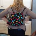 Wearing reversible backpack created with Bird Ross.